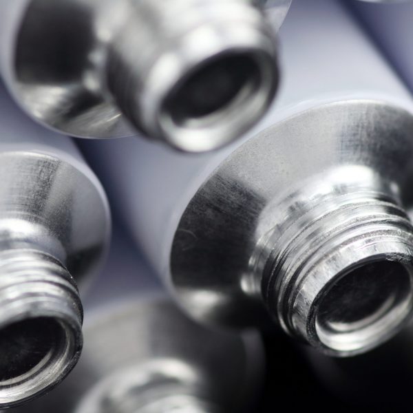 stock-photo-macro-of-a-group-of-new-compressible-aluminum-tubes-for-a-pharmacological-and-beauty-industry-756356317 stock-photo-macro-of-a-group-of-new-compressible-aluminum-tubes-for-a-pharmacological-and-beauty-industry-756356317